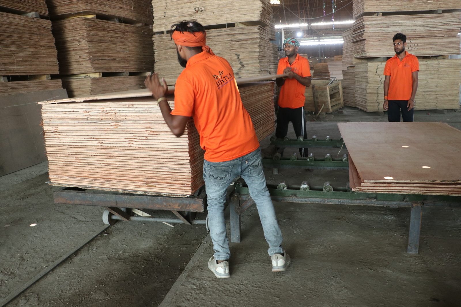 Black and white business cards scattered on a dark surface